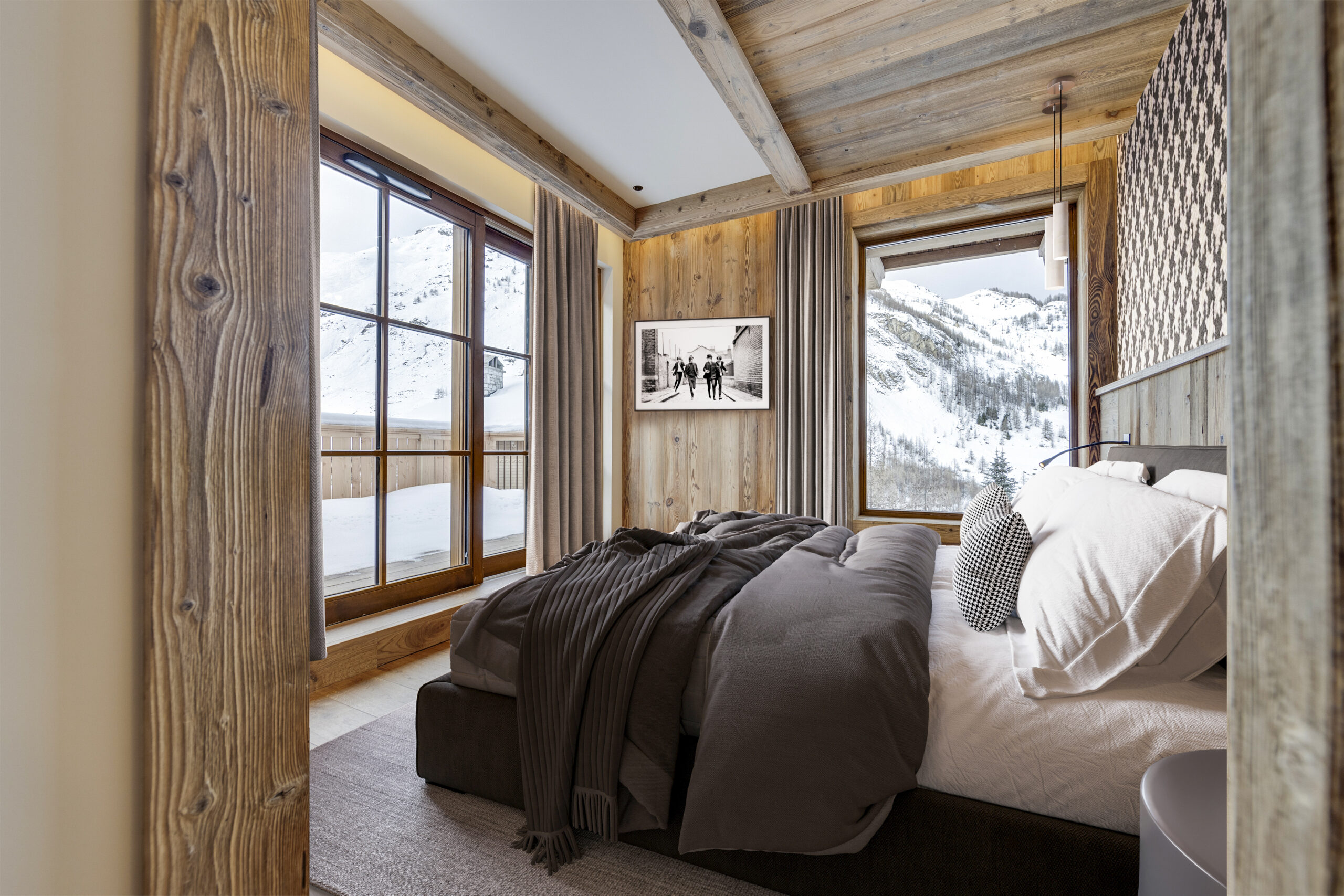 Image de synthèse d'une suite parentale aux tons graphiques dans un chalet Cimalpes, une perspective 3D chalet de luxe signée Pierzo.