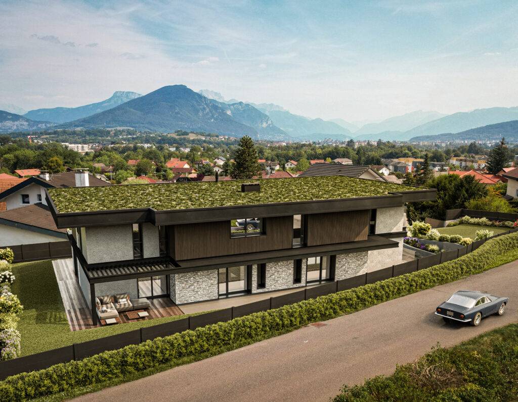 Image 3D permis de construire vue aérienne montrant la toiture végétalisée face aux montagnes.