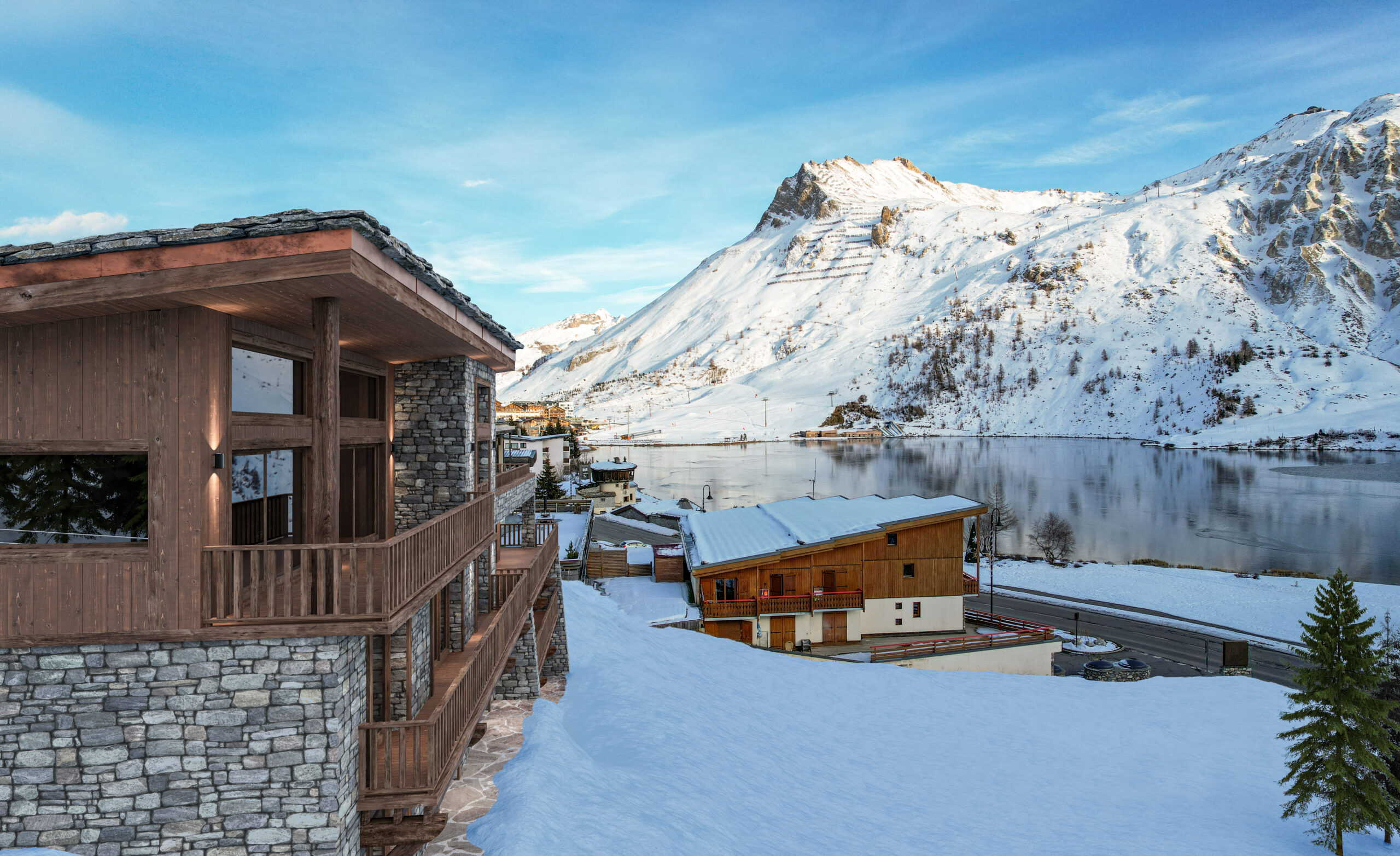 Visualisation 3D de l'imposante façade multi-niveaux en bois et pierre du projet Tolita à Tignes, illustration d'une architecture alpine moderne et d'une insertion paysagère chalet.